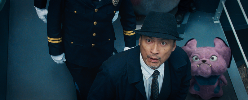 Ken Watanabe’s Detective Yoshida and his Snubbull find themselves looking up at Mewtwo in horror.